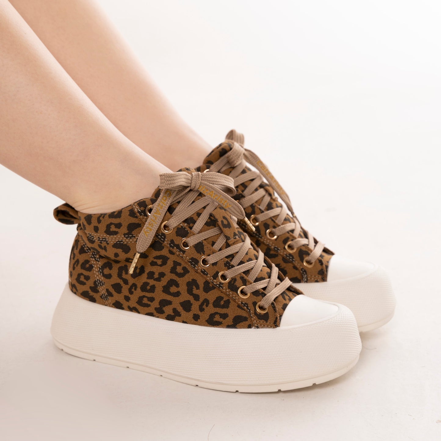 Tenis plataforma LARA con estampado animal print para mujer