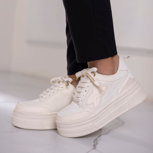 Zapatillas beige AMEL con plataforma elevada y diseño urbano | Calzaristy